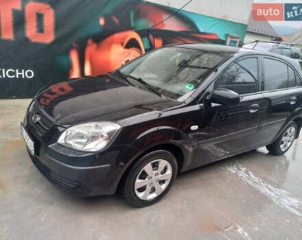 Чорний Кіа Ріо, об'ємом двигуна 1.4 л та пробігом 230 тис. км за 5248 $, фото 5 на Automoto.ua