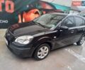 Чорний Кіа Ріо, об'ємом двигуна 1.4 л та пробігом 230 тис. км за 5248 $, фото 5 на Automoto.ua