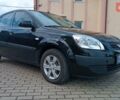 Черный Киа Рио, объемом двигателя 1.4 л и пробегом 181 тыс. км за 3850 $, фото 1 на Automoto.ua