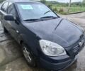 Чорний Кіа Ріо, об'ємом двигуна 1.4 л та пробігом 253 тис. км за 3518 $, фото 1 на Automoto.ua