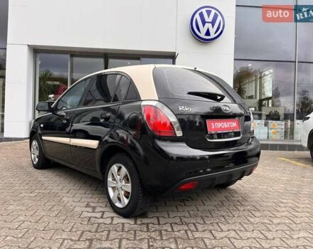 Чорний Кіа Ріо, об'ємом двигуна 1.5 л та пробігом 265 тис. км за 4700 $, фото 4 на Automoto.ua