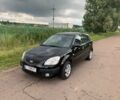 Черный Киа Рио, объемом двигателя 1.4 л и пробегом 98 тыс. км за 6200 $, фото 1 на Automoto.ua