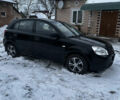 Чорний Кіа Ріо, об'ємом двигуна 1.4 л та пробігом 220 тис. км за 4400 $, фото 5 на Automoto.ua