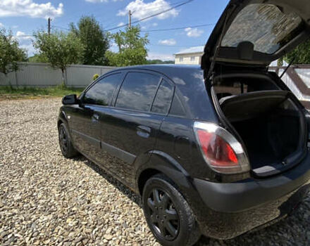 Чорний Кіа Ріо, об'ємом двигуна 1.4 л та пробігом 207 тис. км за 4199 $, фото 4 на Automoto.ua