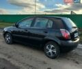 Черный Киа Рио, объемом двигателя 1.4 л и пробегом 220 тыс. км за 4399 $, фото 6 на Automoto.ua