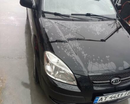 Чорний Кіа Ріо, об'ємом двигуна 1.4 л та пробігом 230 тис. км за 5248 $, фото 9 на Automoto.ua