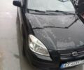 Чорний Кіа Ріо, об'ємом двигуна 1.4 л та пробігом 230 тис. км за 5248 $, фото 9 на Automoto.ua