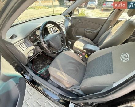 Черный Киа Рио, объемом двигателя 1.4 л и пробегом 134 тыс. км за 5300 $, фото 3 на Automoto.ua