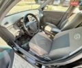 Черный Киа Рио, объемом двигателя 1.4 л и пробегом 134 тыс. км за 5300 $, фото 3 на Automoto.ua