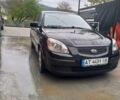 Чорний Кіа Ріо, об'ємом двигуна 1.4 л та пробігом 230 тис. км за 5248 $, фото 8 на Automoto.ua