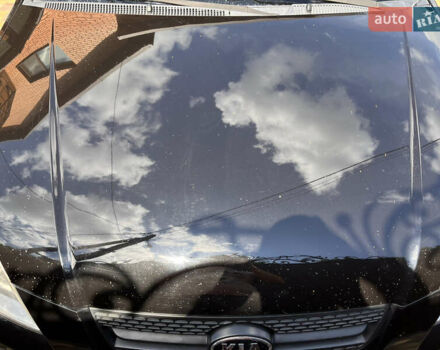 Черный Киа Рио, объемом двигателя 1.4 л и пробегом 174 тыс. км за 4200 $, фото 35 на Automoto.ua