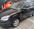 Чорний Кіа Ріо, об'ємом двигуна 1.4 л та пробігом 230 тис. км за 5179 $, фото 3 на Automoto.ua