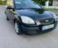 Чорний Кіа Ріо, об'ємом двигуна 1.4 л та пробігом 176 тис. км за 3899 $, фото 8 на Automoto.ua