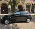 Черный Киа Рио, объемом двигателя 1.4 л и пробегом 245 тыс. км за 5800 $, фото 4 на Automoto.ua