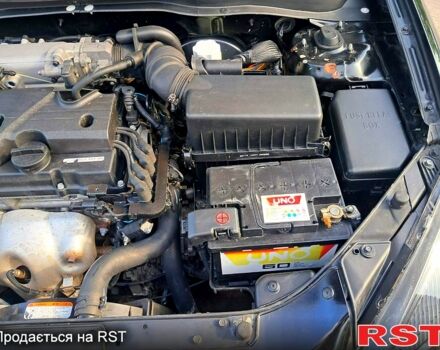 Черный Киа Рио, объемом двигателя 1.4 л и пробегом 107 тыс. км за 5000 $, фото 1 на Automoto.ua