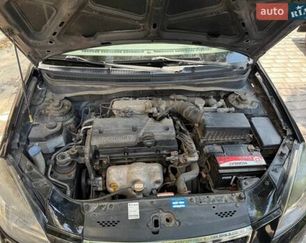 Черный Киа Рио, объемом двигателя 1.4 л и пробегом 245 тыс. км за 5800 $, фото 9 на Automoto.ua