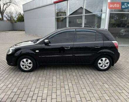 Черный Киа Рио, объемом двигателя 1.4 л и пробегом 172 тыс. км за 5700 $, фото 3 на Automoto.ua