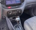 Чорний Кіа Ріо, об'ємом двигуна 1.4 л та пробігом 245 тис. км за 4750 $, фото 12 на Automoto.ua