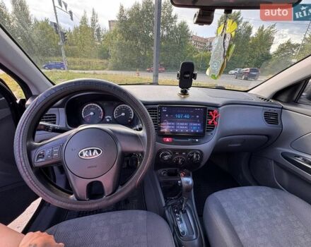 Черный Киа Рио, объемом двигателя 1.4 л и пробегом 245 тыс. км за 4650 $, фото 8 на Automoto.ua