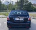 Чорний Кіа Ріо, об'ємом двигуна 1.4 л та пробігом 245 тис. км за 4750 $, фото 2 на Automoto.ua
