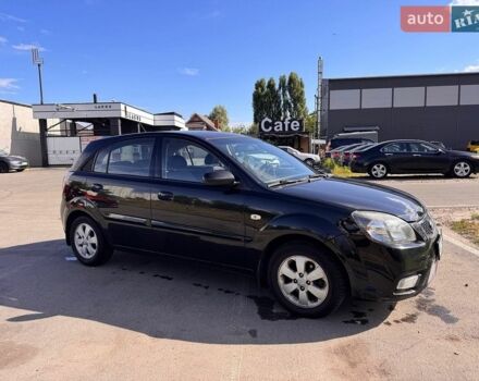Черный Киа Рио, объемом двигателя 1.4 л и пробегом 245 тыс. км за 4650 $, фото 1 на Automoto.ua