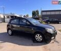 Чорний Кіа Ріо, об'ємом двигуна 1.4 л та пробігом 245 тис. км за 4750 $, фото 1 на Automoto.ua