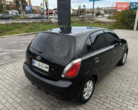 Черный Киа Рио, объемом двигателя 1.4 л и пробегом 172 тыс. км за 5700 $, фото 7 на Automoto.ua