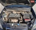 Чорний Кіа Ріо, об'ємом двигуна 1.4 л та пробігом 245 тис. км за 4750 $, фото 10 на Automoto.ua