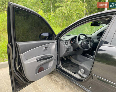Черный Киа Рио, объемом двигателя 1.4 л и пробегом 193 тыс. км за 5000 $, фото 7 на Automoto.ua