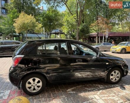 Черный Киа Рио, объемом двигателя 1.4 л и пробегом 245 тыс. км за 5800 $, фото 1 на Automoto.ua