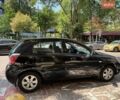Черный Киа Рио, объемом двигателя 1.4 л и пробегом 245 тыс. км за 5800 $, фото 1 на Automoto.ua