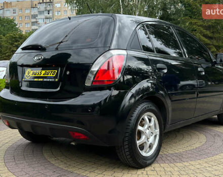 Чорний Кіа Ріо, об'ємом двигуна 1.4 л та пробігом 193 тис. км за 4999 $, фото 6 на Automoto.ua
