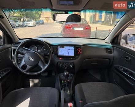 Черный Киа Рио, объемом двигателя 1.4 л и пробегом 245 тыс. км за 5800 $, фото 7 на Automoto.ua