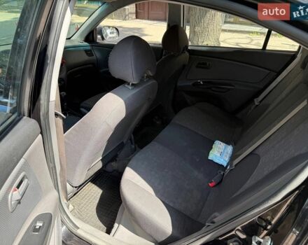 Черный Киа Рио, объемом двигателя 1.4 л и пробегом 245 тыс. км за 5800 $, фото 6 на Automoto.ua