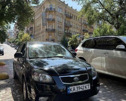 Черный Киа Рио, объемом двигателя 1.4 л и пробегом 245 тыс. км за 5800 $, фото 2 на Automoto.ua