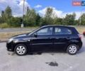 Черный Киа Рио, объемом двигателя 1.4 л и пробегом 245 тыс. км за 4650 $, фото 3 на Automoto.ua