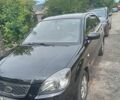Черный Киа Рио, объемом двигателя 1.4 л и пробегом 273 тыс. км за 5700 $, фото 1 на Automoto.ua