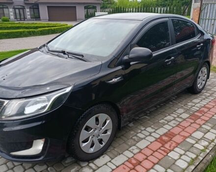 Черный Киа Рио, объемом двигателя 1.4 л и пробегом 3 тыс. км за 6000 $, фото 1 на Automoto.ua