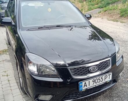 Чорний Кіа Ріо, об'ємом двигуна 1.4 л та пробігом 274 тис. км за 5800 $, фото 1 на Automoto.ua