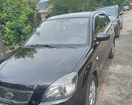 Чорний Кіа Ріо, об'ємом двигуна 1.4 л та пробігом 274 тис. км за 5800 $, фото 4 на Automoto.ua