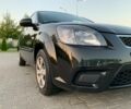 Черный Киа Рио, объемом двигателя 1.4 л и пробегом 200 тыс. км за 6300 $, фото 2 на Automoto.ua