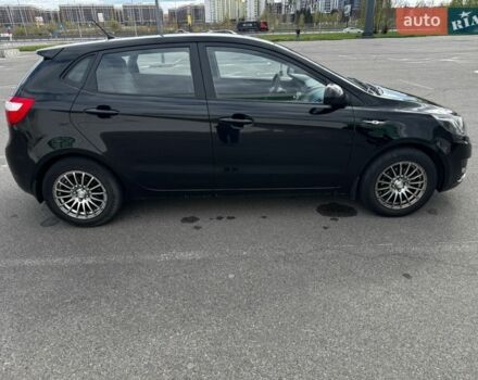 Черный Киа Рио, объемом двигателя 1.4 л и пробегом 125 тыс. км за 6000 $, фото 2 на Automoto.ua