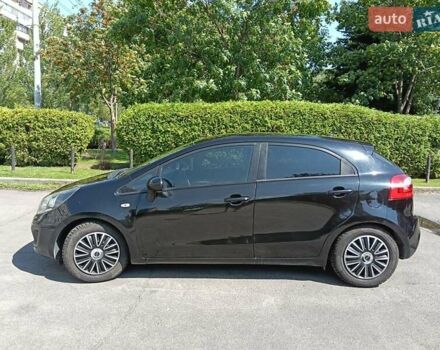Черный Киа Рио, объемом двигателя 1.25 л и пробегом 252 тыс. км за 5999 $, фото 7 на Automoto.ua