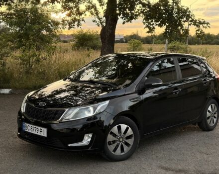 Черный Киа Рио, объемом двигателя 1.6 л и пробегом 165 тыс. км за 7822 $, фото 2 на Automoto.ua