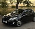 Чорний Кіа Ріо, об'ємом двигуна 1.6 л та пробігом 165 тис. км за 7800 $, фото 2 на Automoto.ua