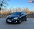 Черный Киа Рио, объемом двигателя 1.6 л и пробегом 155 тыс. км за 7300 $, фото 1 на Automoto.ua