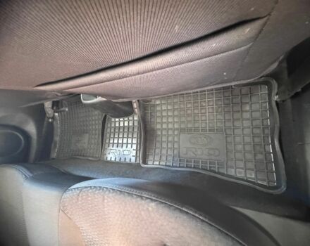 Чорний Кіа Ріо, об'ємом двигуна 1.4 л та пробігом 53 тис. км за 8507 $, фото 10 на Automoto.ua