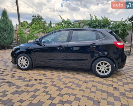 Черный Киа Рио, объемом двигателя 1.4 л и пробегом 172 тыс. км за 5700 $, фото 6 на Automoto.ua