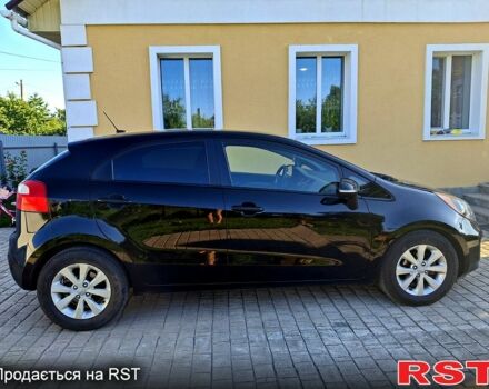 Чорний Кіа Ріо, об'ємом двигуна 1.6 л та пробігом 144 тис. км за 7300 $, фото 4 на Automoto.ua