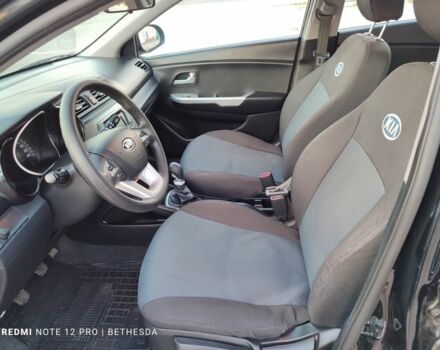 Черный Киа Рио, объемом двигателя 1.4 л и пробегом 41 тыс. км за 8200 $, фото 13 на Automoto.ua